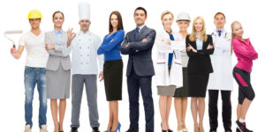 Group of people dressed in various occupational outfits, including business people, a chef, a doctor, and trades people, representing the variety of business skills required for different jobs.