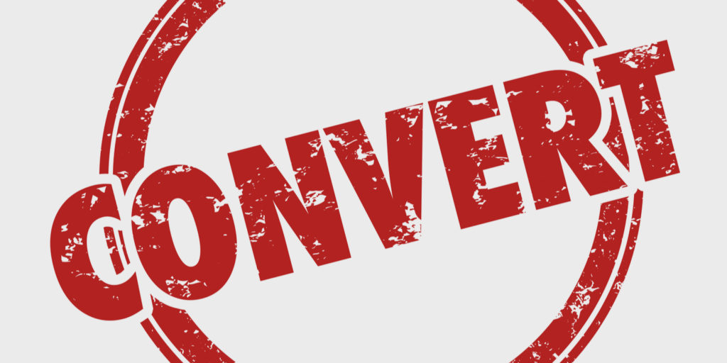 'CONVERT' logo stamped in red ink on white background.