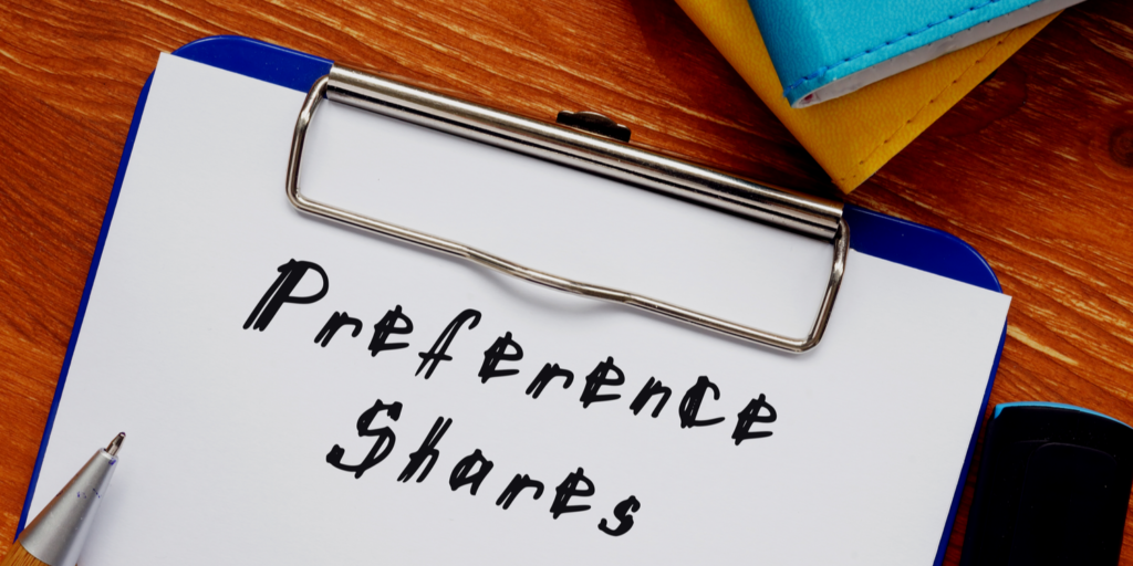 White sheet of paper held in a clipboard with the heading 'Preference Shares'