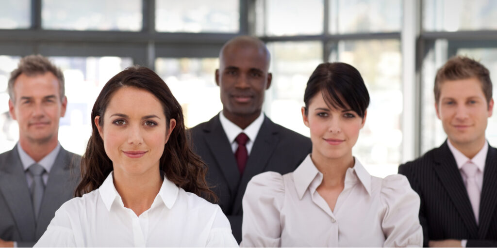 Group of directors, shareholders, PSCs and secretaries in business suits.