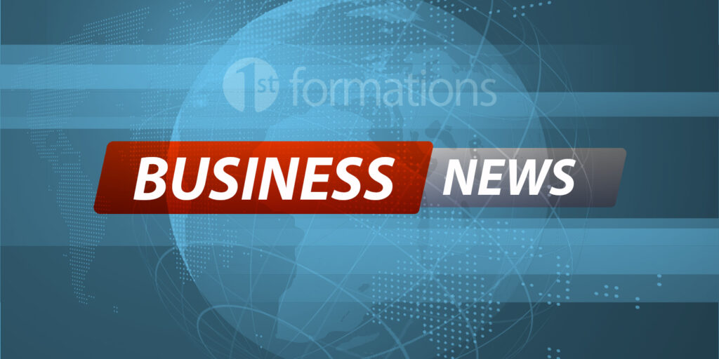 'BUSINESS NEWS' written on blue background