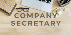 A photo of a desk with 'COMPANY SECRETARY' overlaid on top