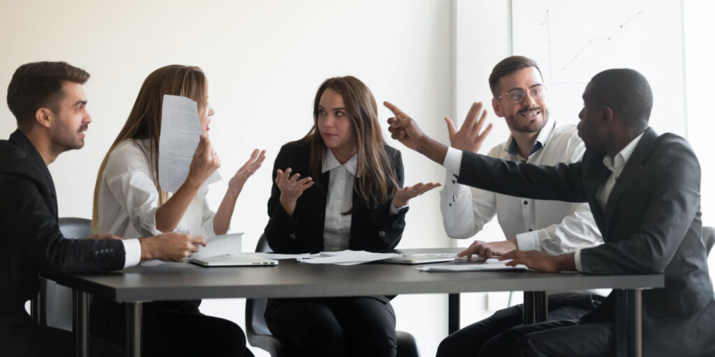 Five frustrated and angry shareholders in dispute at a meeting.