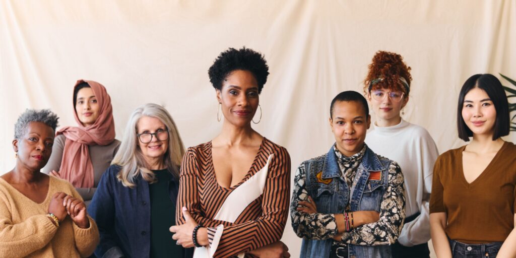 A diverse group of six women founders looking at the camera.