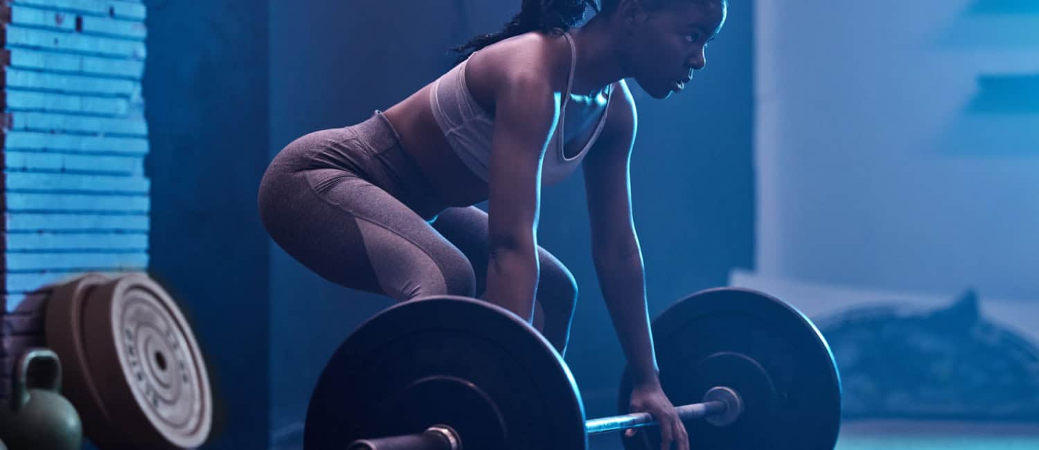 Woman weightlifting in gym